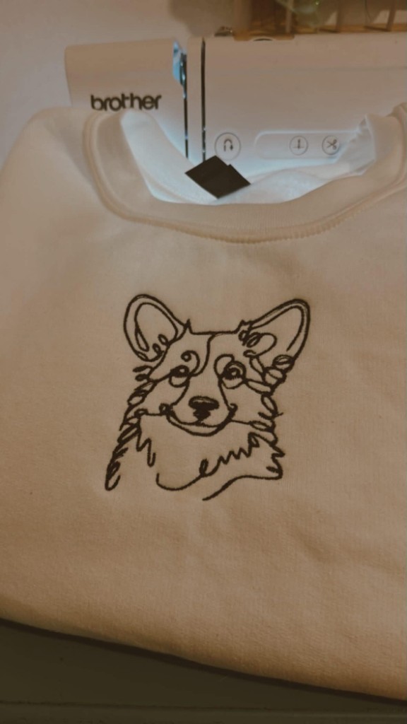 Corgi line-art embroidery on sweatshirt